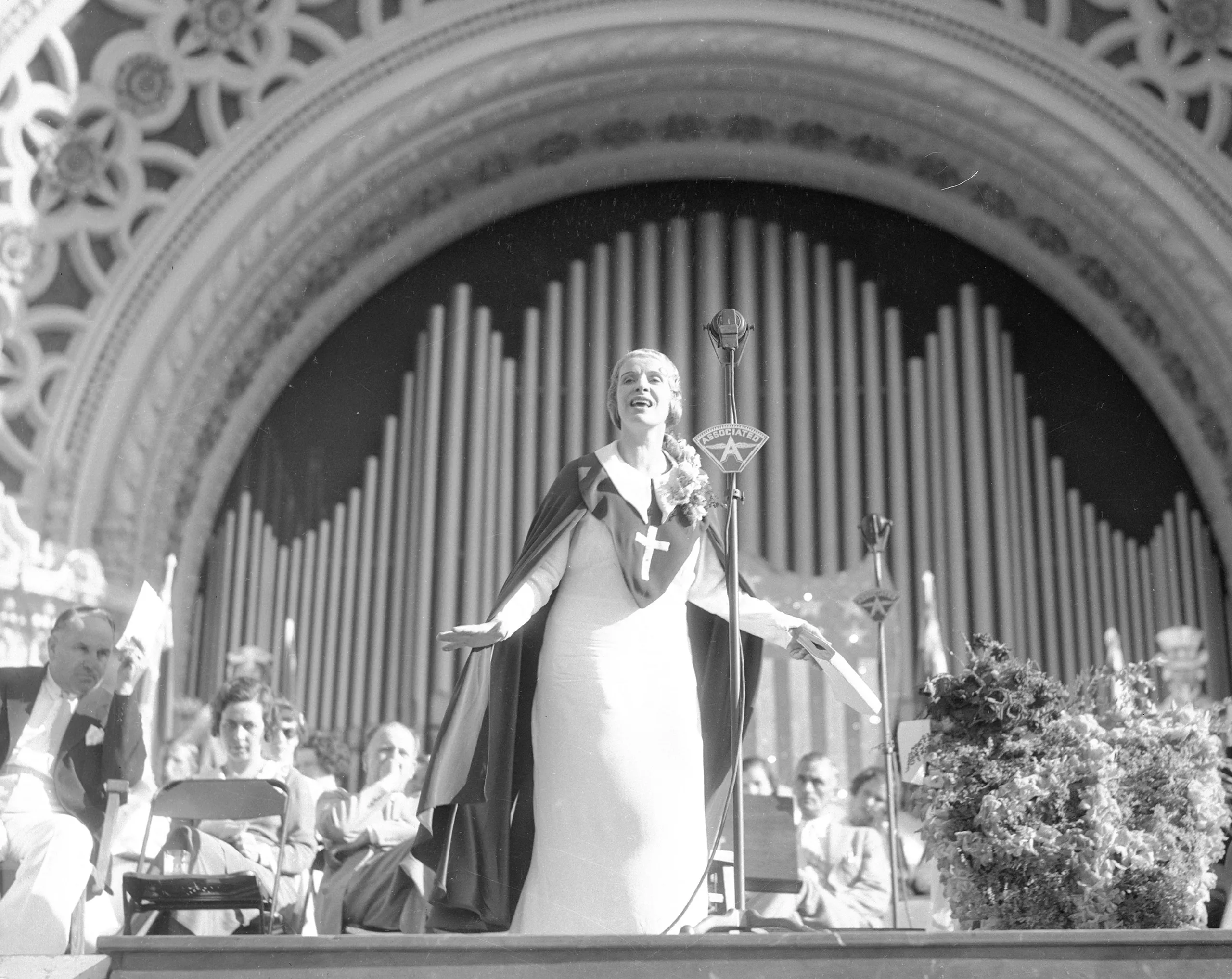 Aimee Semple McPherson preaching at Balboa Park, San Diego, 1921